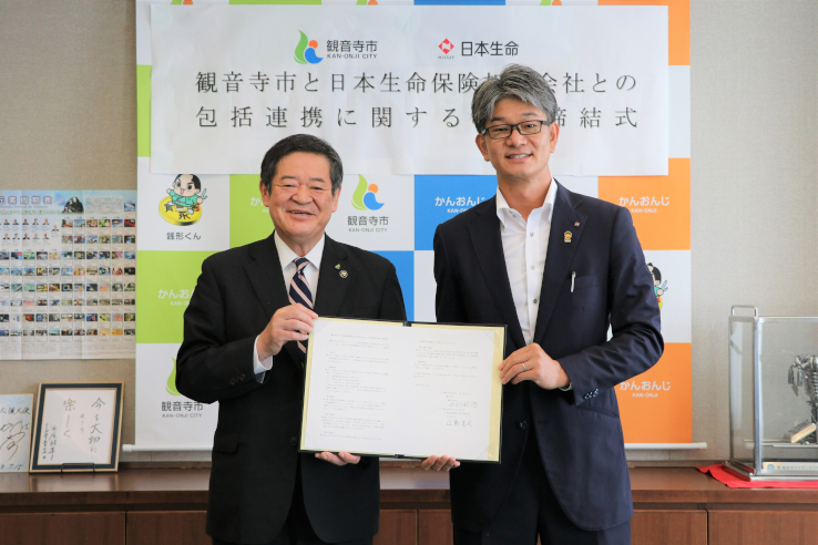 佐伯市長と近藤憲司支社長